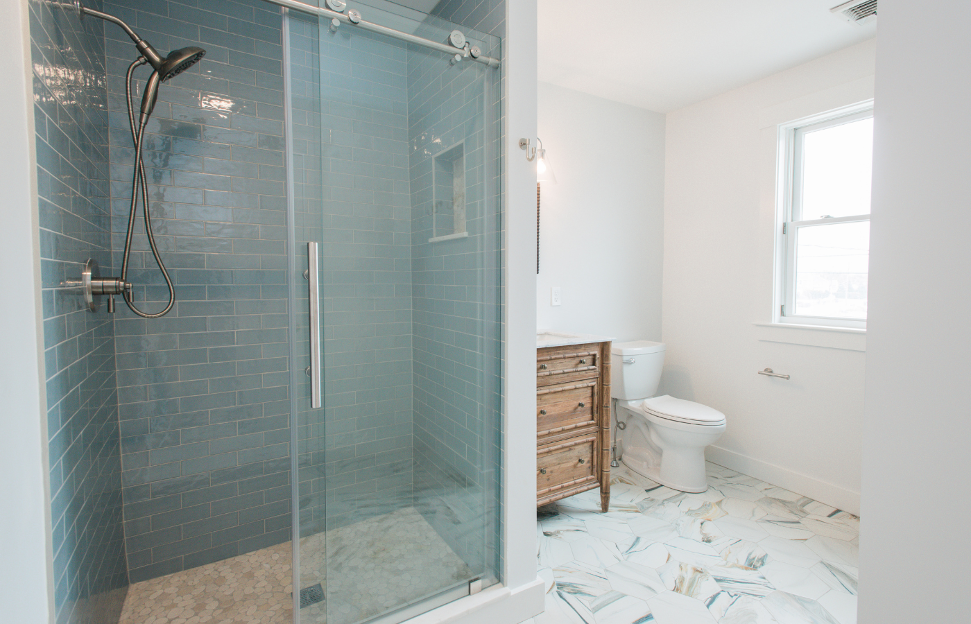 teal and white bathroom refresh - tile and shower