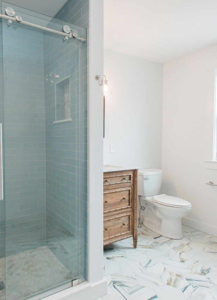 teal and white bathroom refresh - tile and shower