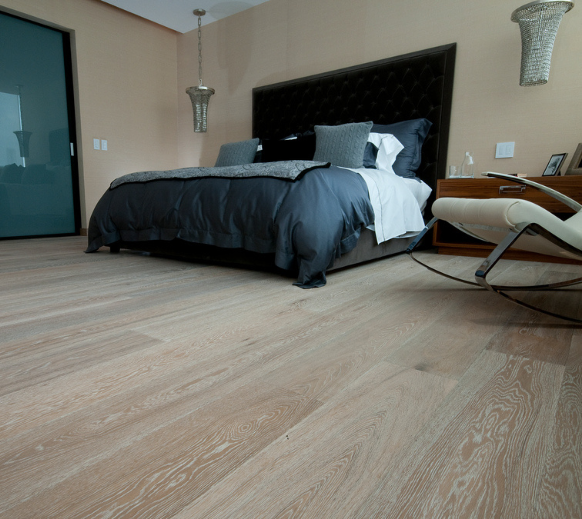 Light hardwood flooring in bedroom